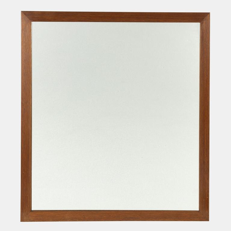 Firma Svenskt Tenn, a mahogany framed mirror, mid 20th century.