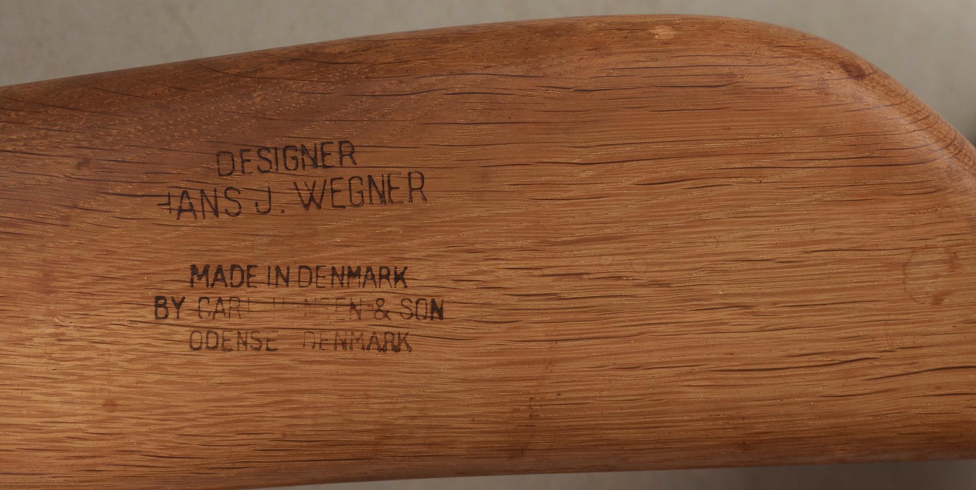 A pair of Hans J Wegner oak and rattan 'CH-27' armchairs, Carl Hansen & Son, Denmark, 1950's-60's.