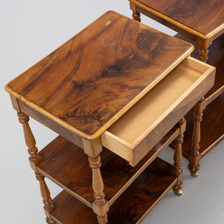A set of two mahogany etageres. 19th Century.
