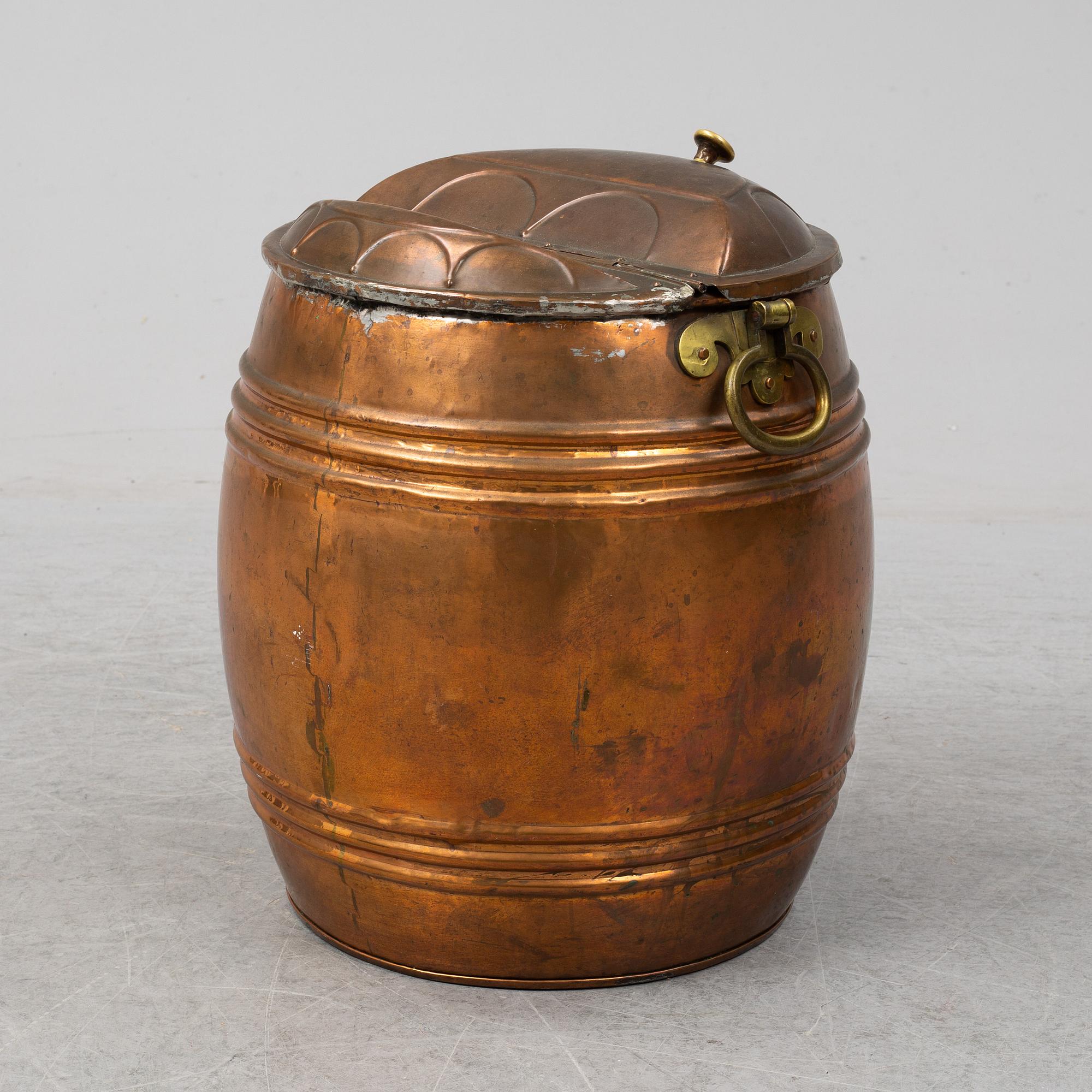 A 19th century copper water barrel.