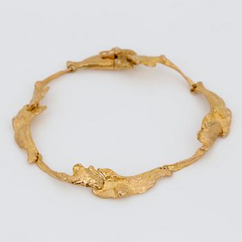 ARMBAND, guld 14K, "Orchid Psychedelic", Björn Weckström, Lapponia 1971. Vikt ca 13 g.