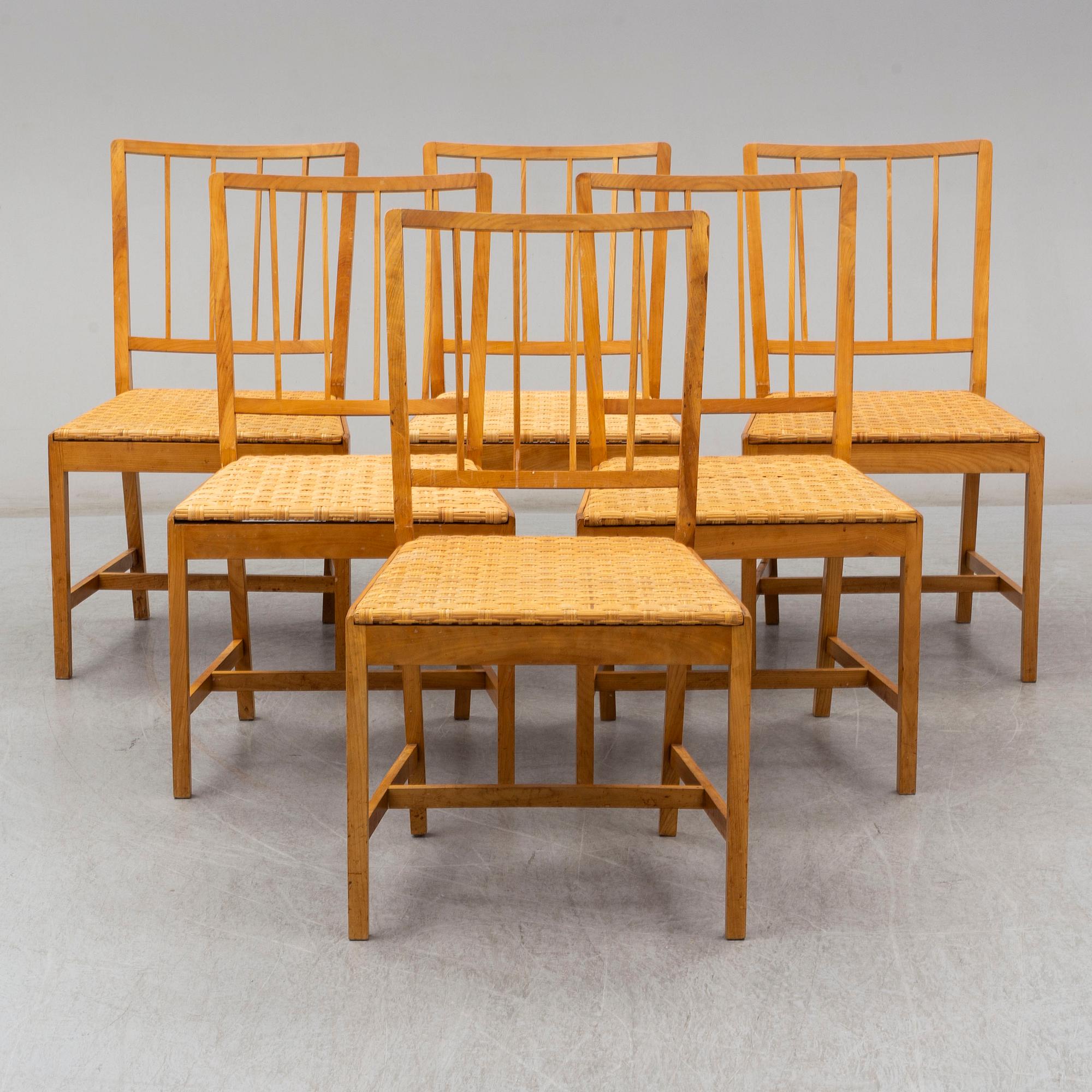 JOSEF FRANK, a set of six elm and rattan dining chairs, model 800.