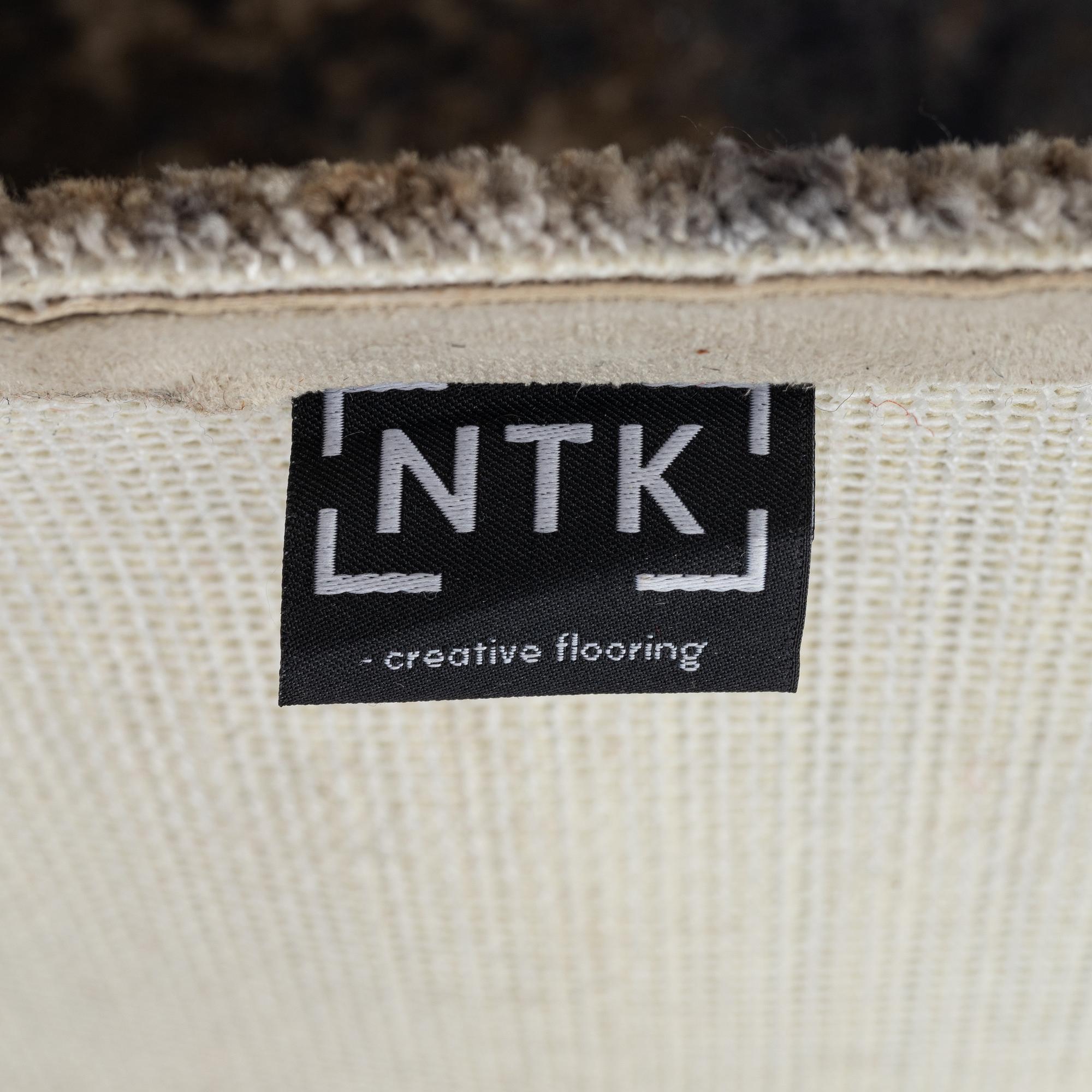 A machine-tufted 'Samarkand' carpet, Slettvoll/NTK Atelier, c. 240 x 240 cm.