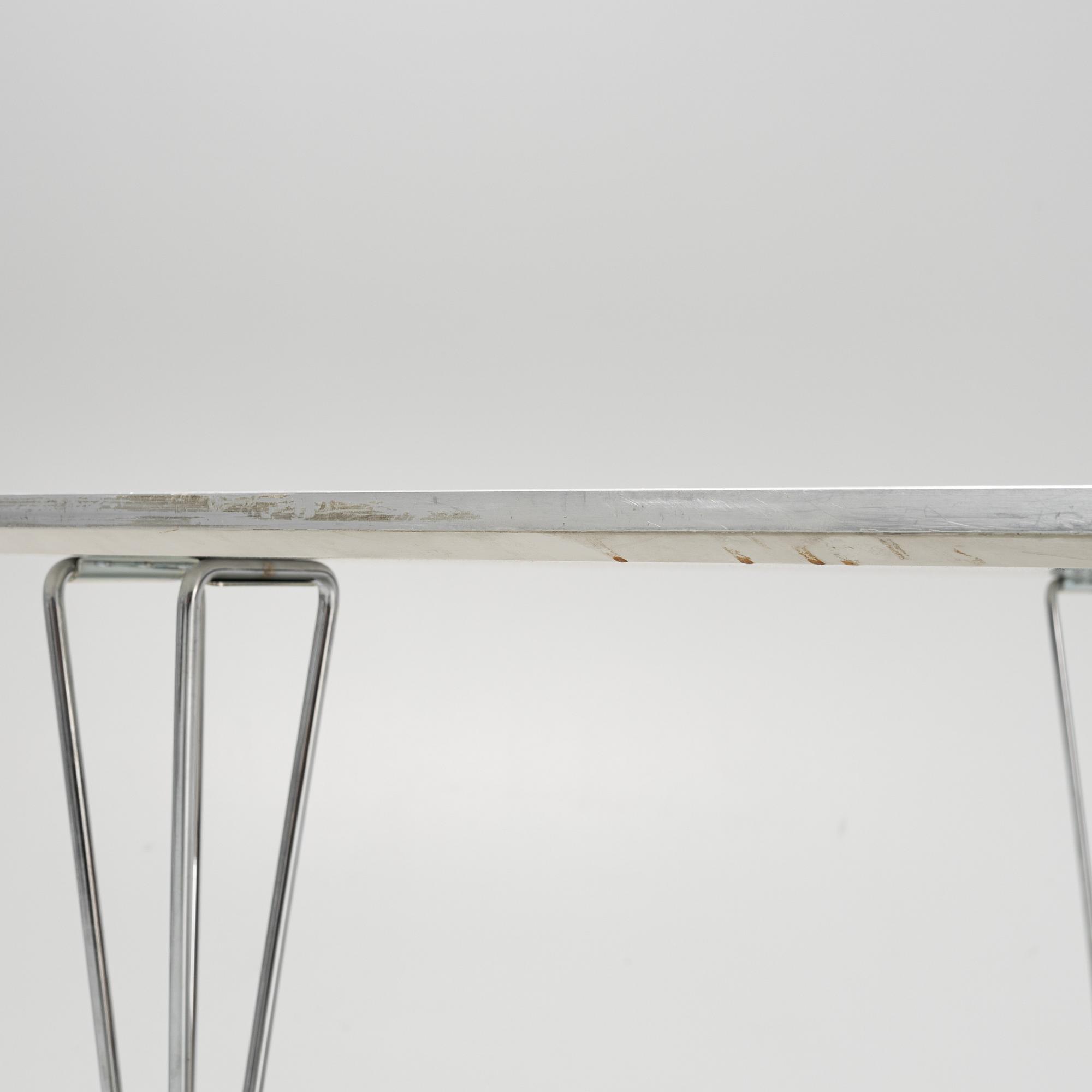 Bruno Mathsson & Piet Hein, dining table, for Fritz Hansen, dated 1994.