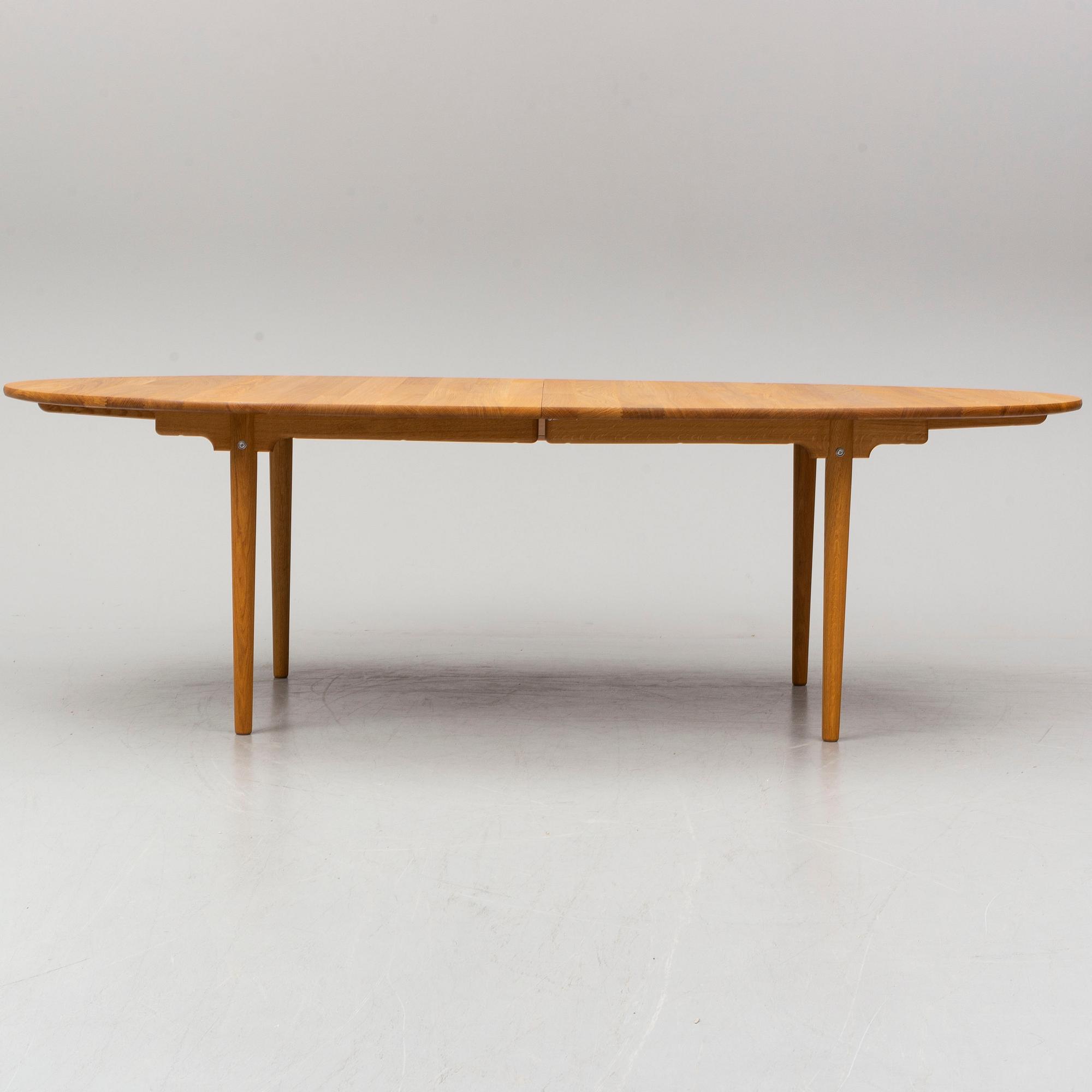 HANS J WEGNER, a oak dining table model CH339, Carl Hansen & Son, Denmark.
