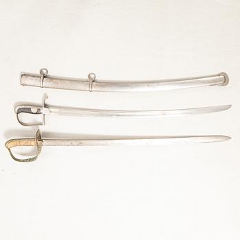 Swords 2 pcs, Swedish, m/1867 for the cavalry, and m/1831 for artillery personnel, with scabbard.