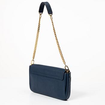 Chloé, a blue leather bag.
