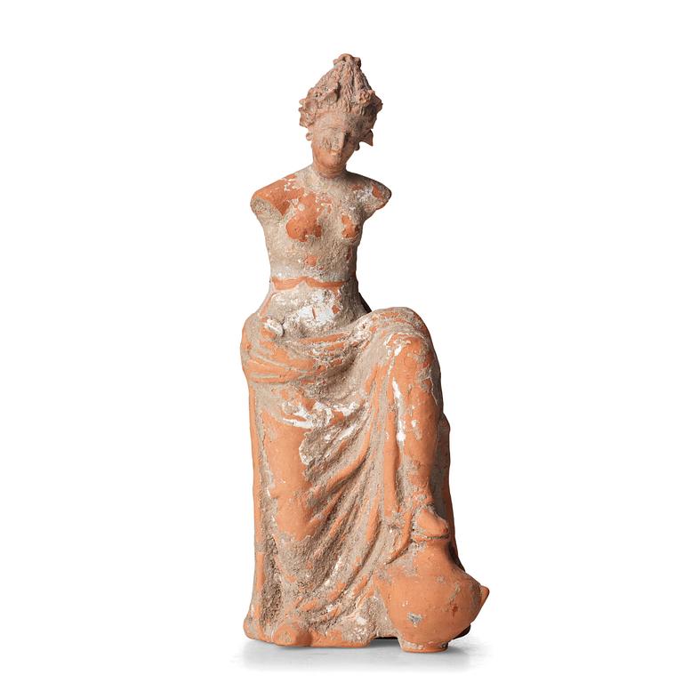 A Greek Attic figure of a Muse, probably 500-200 B.C.