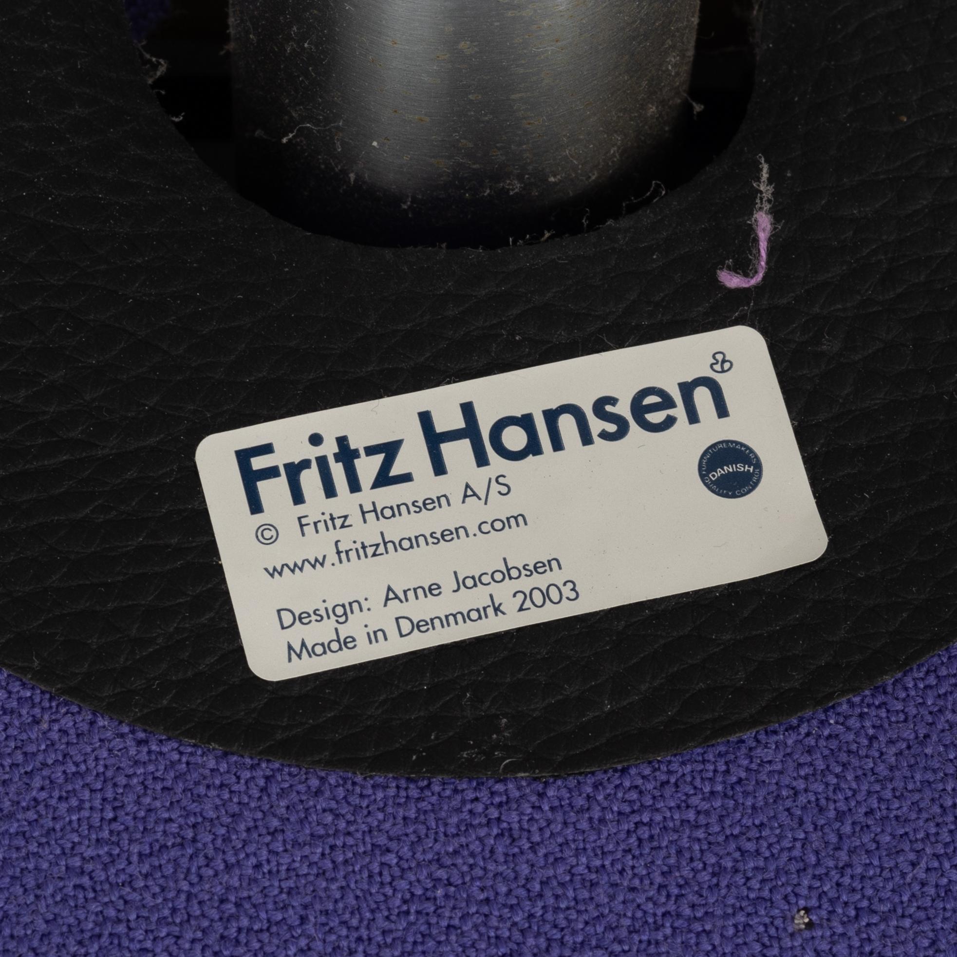 Arne Jacobsen, an armchair with footstool, "The Egg", Fritz Hansen, Denmark, 2003.