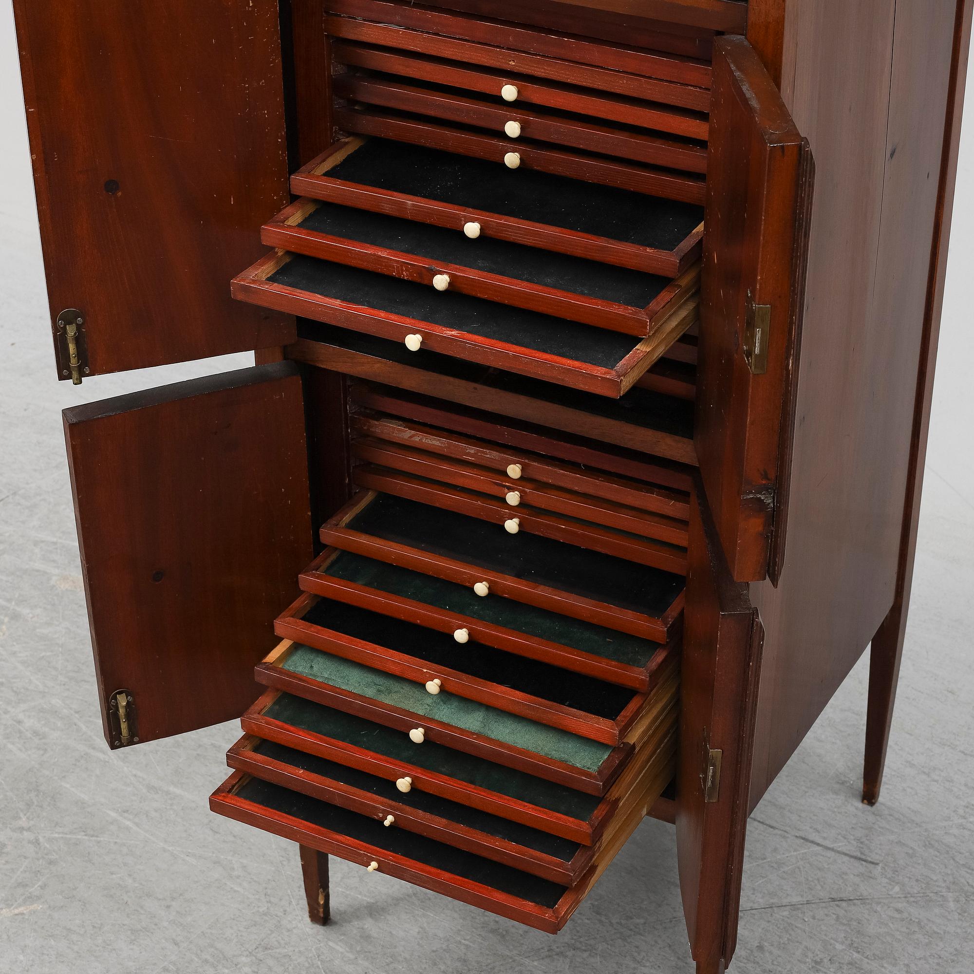 An early 20th Century mahogany cabinet.