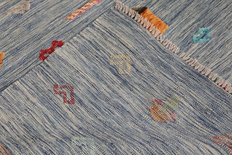 A Kelim carpet, figural, c. 236 x 171 cm.