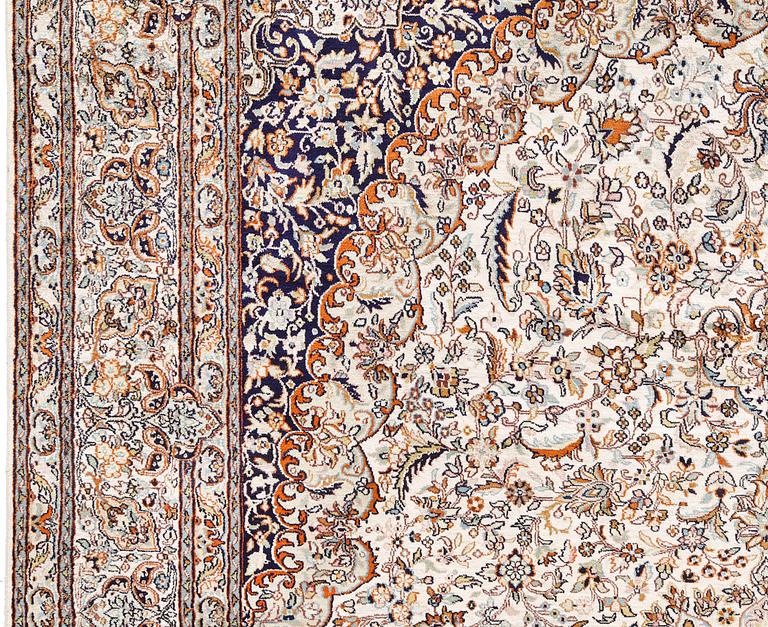 A silk Kashmir carpet, approx. 300 x 200 cm.