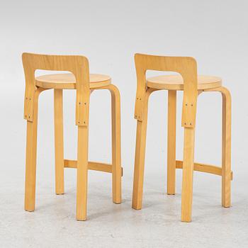 Alvar Aalto, a pair of model 'K65' birch bar chairs, Artek, Finland.