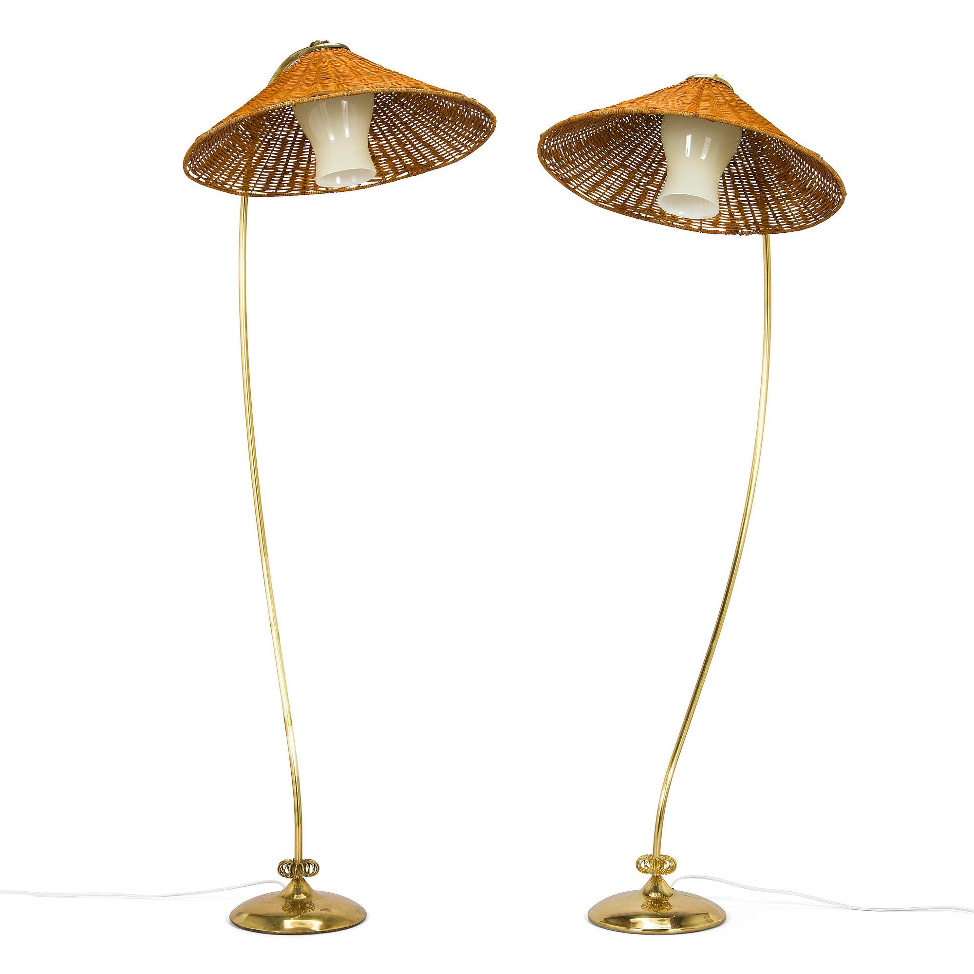 A pair of mid-20th century floor lamps.