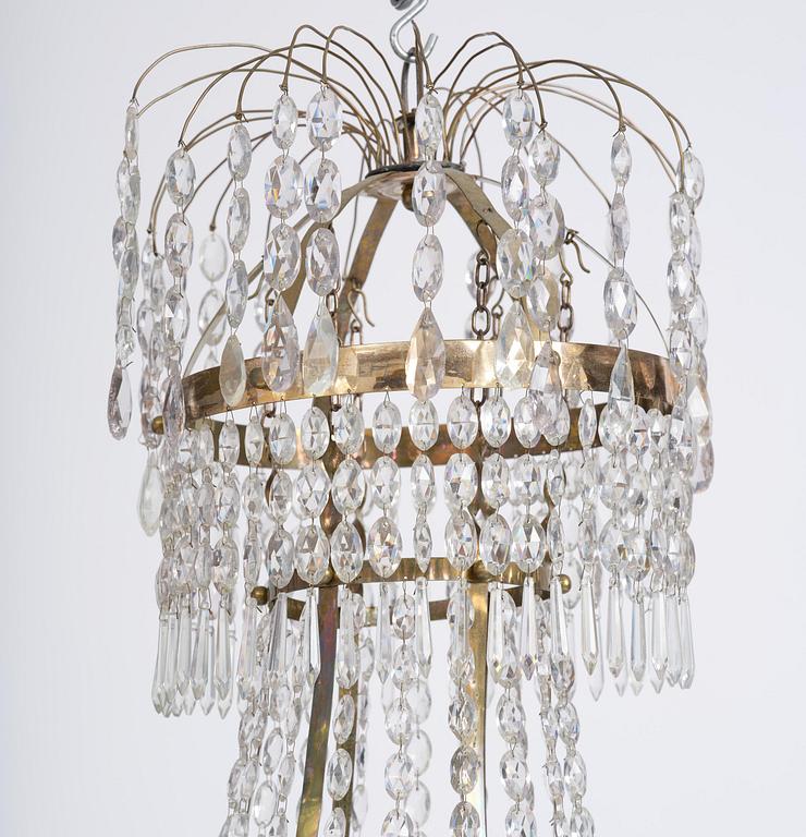 A late Gustavian gilt brass and cut glass seven-light chandelier, Stockholm late 18th century.