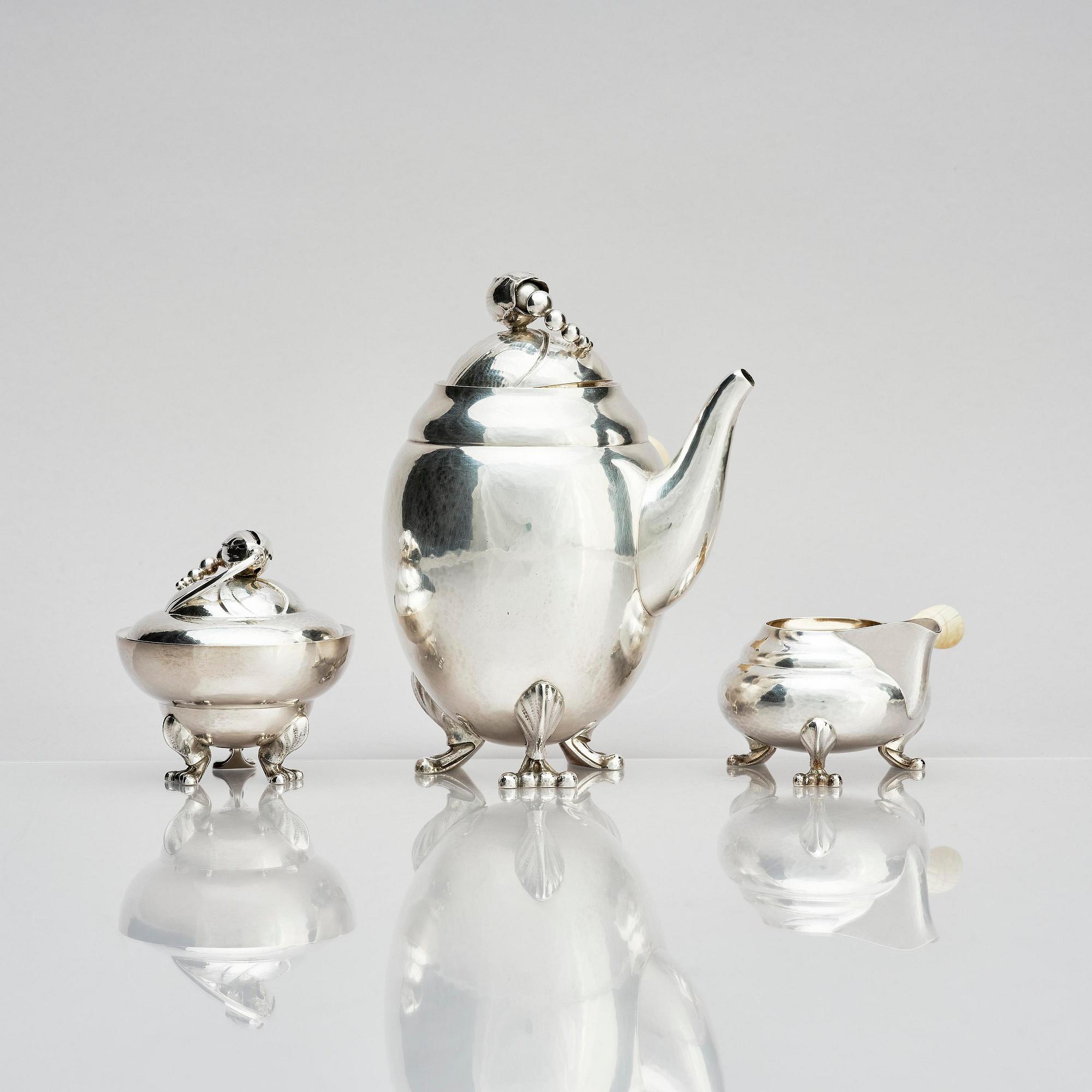Georg Jensen, a three pieces coffee service in sterling silver, "Magnolia/Blossom", Copenhagen 1933-44.