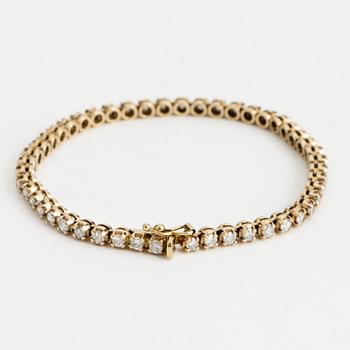 RIVIÈREARMBAND, 14K guld med 48 briljanter totalt ca 2.40 ct.