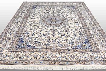 A carpet, Nain part silk s.k 9LAA, ca 355 x 260 cm.
