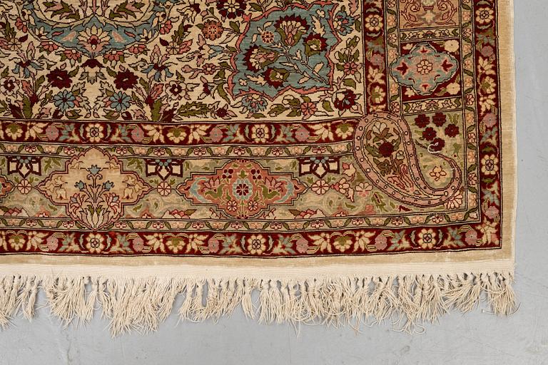 A rug, Old silk Hereke, ca 152 x 110 cm.