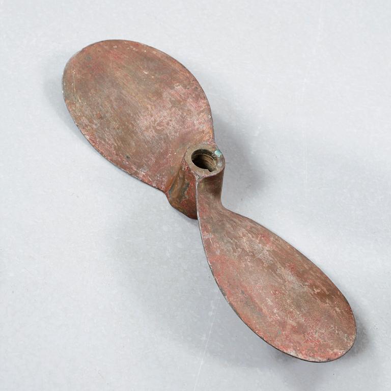 Four 20th century bronze propellers.