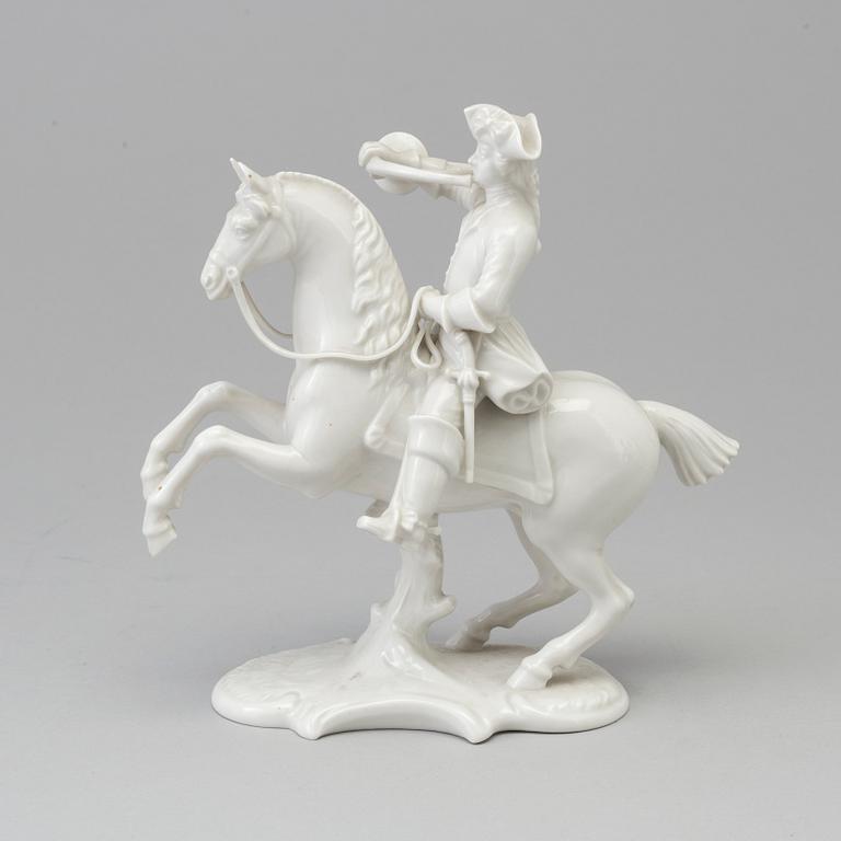 A white glazed Nymphenburg porcelain figure of a huntsman, Germany 20th Century.