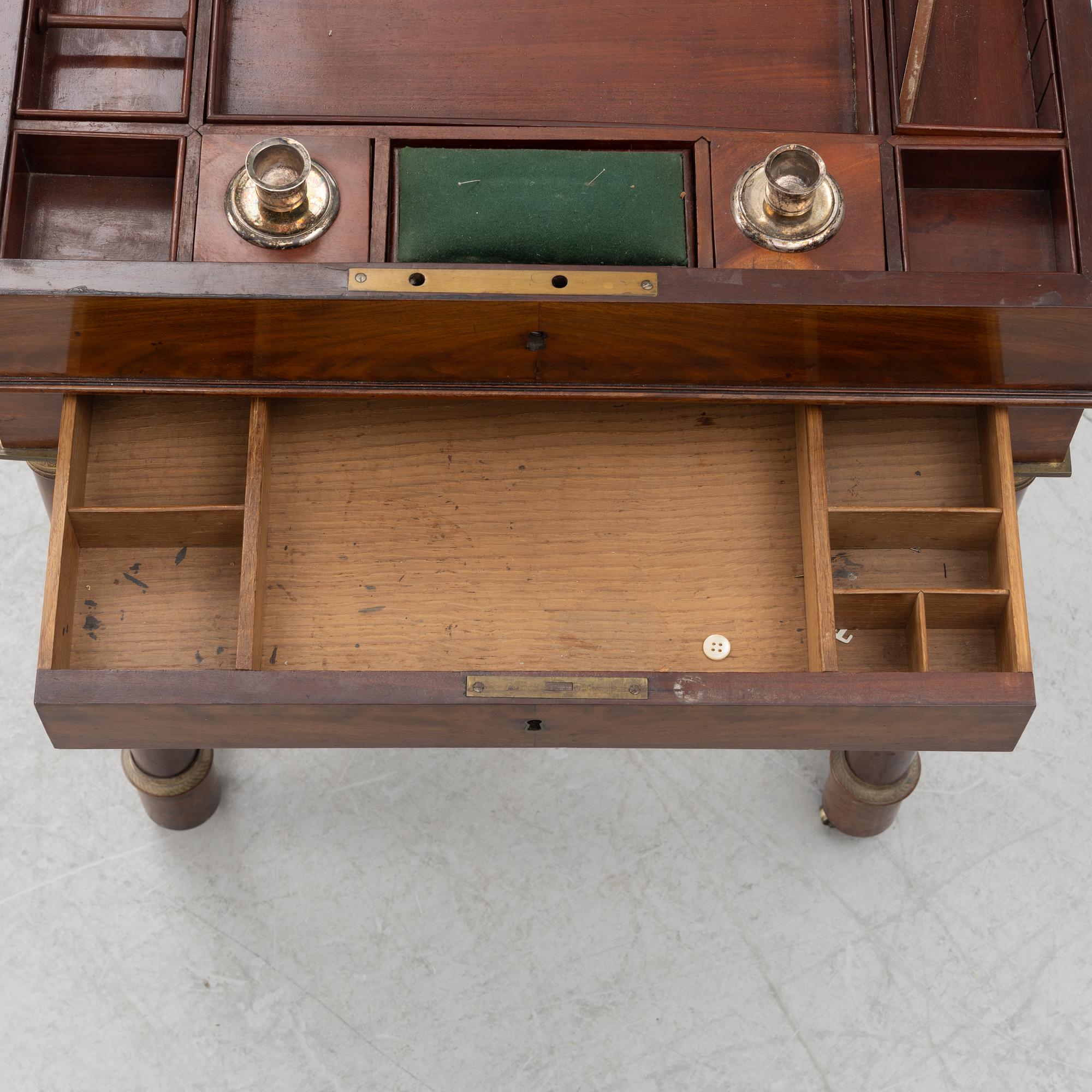 A French Empire mahogany sewing table, first part 19th century.