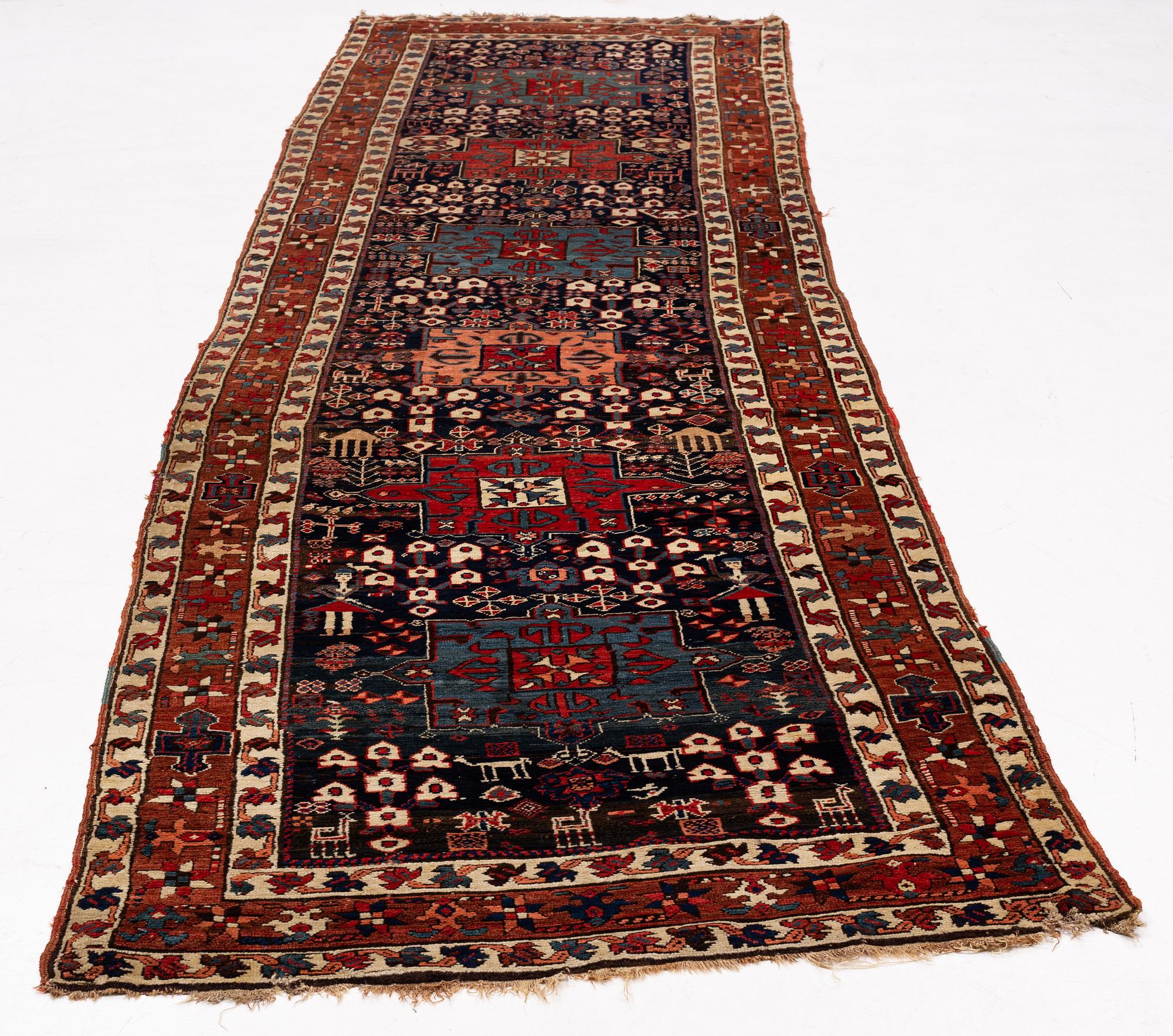 A persian gallery carpet, ca 400 x 110 cm.