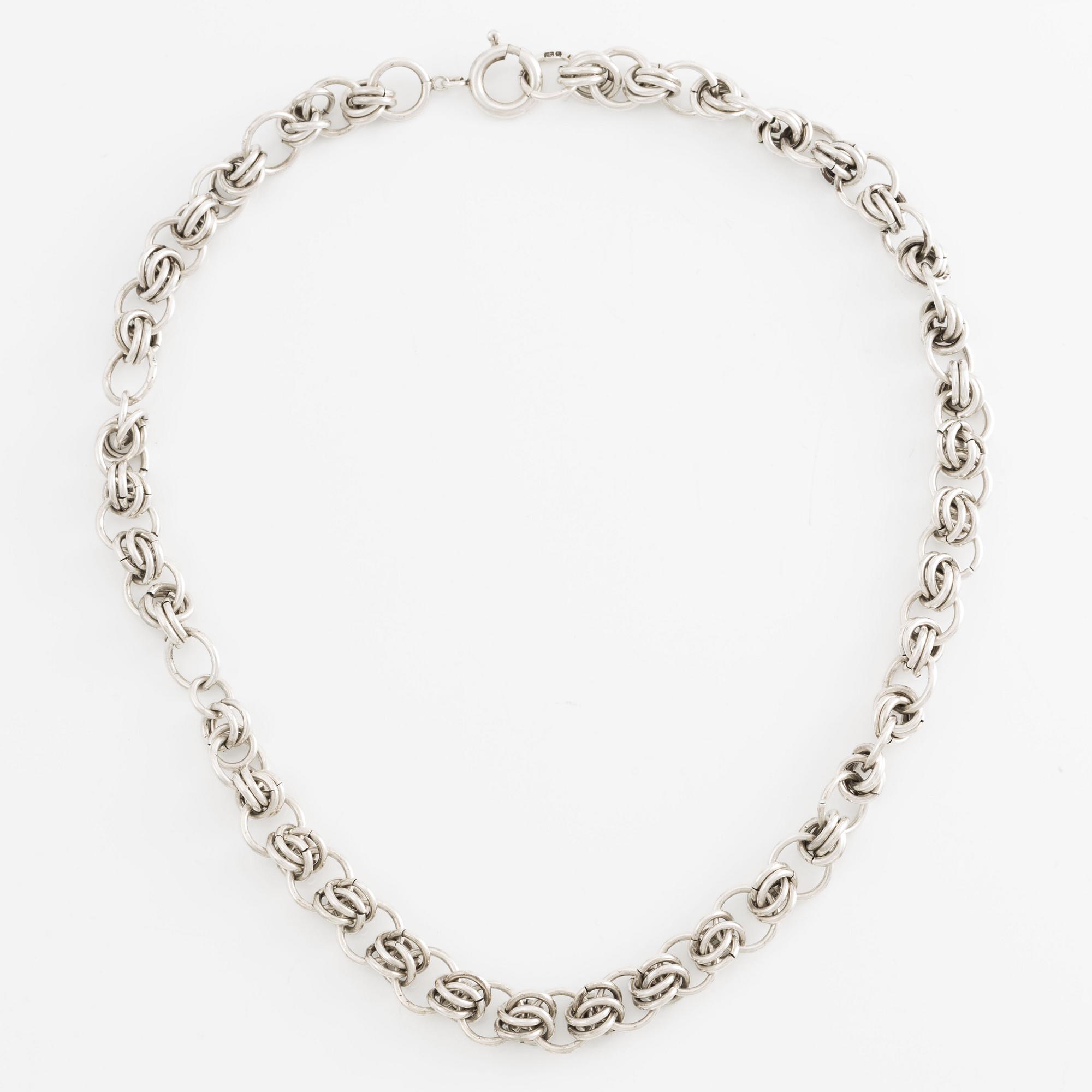 Silver necklace.