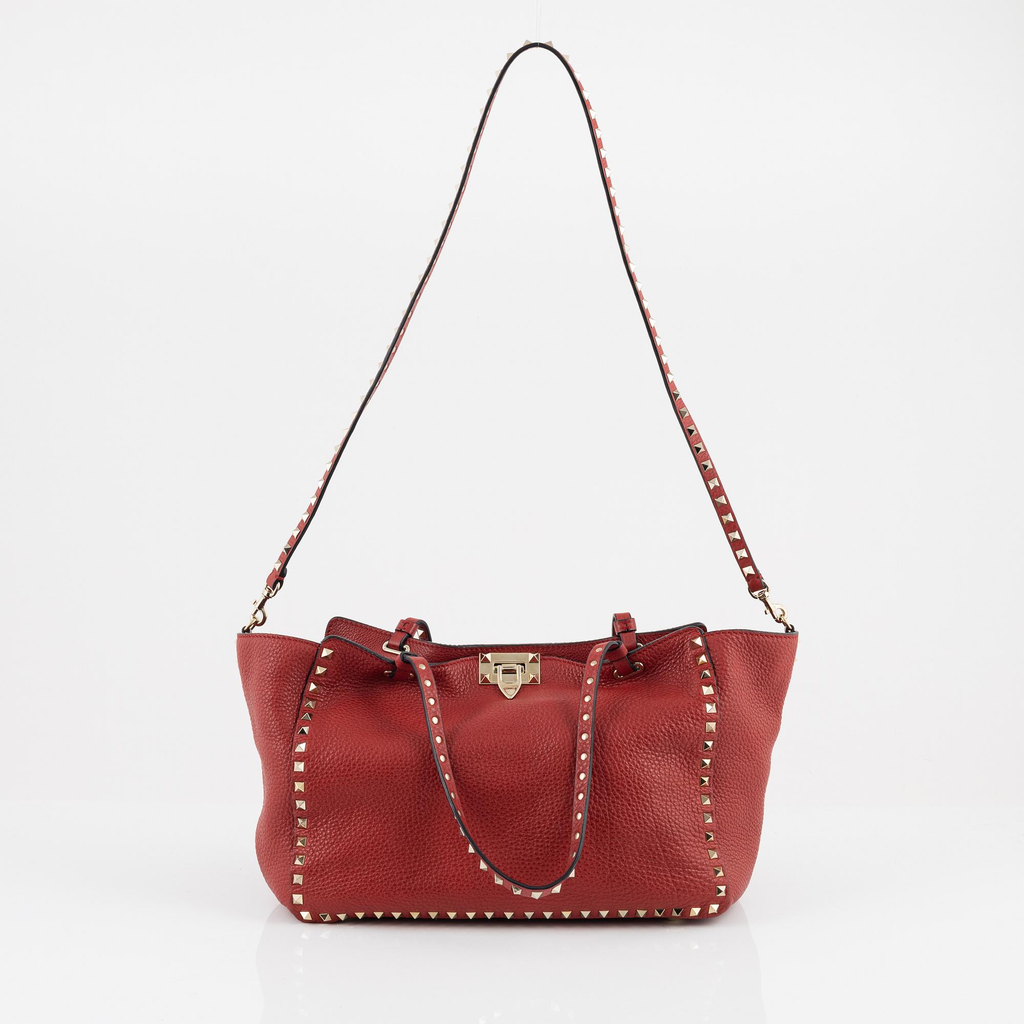 Valentino Gravani, a red leather studded tote bag, 2018.