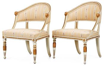 599. Two matched late Gustavian early 19th Century armchairs.
