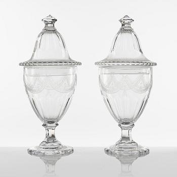 A pair of Gustavian style lidded glass vases, circa 1900.