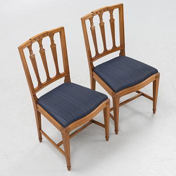 A Dining Table and Twelve Chairs, late Gustavian style, 20th Century.