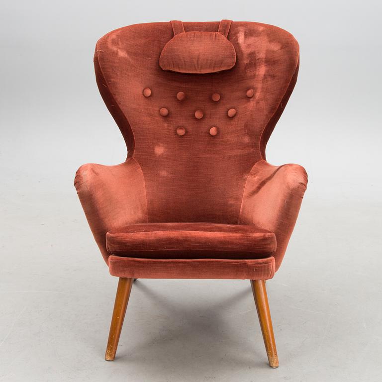 A mid-20th century 'Siesta' armchair for Puunveisto Oy - Träsnideri Ab, Finland.