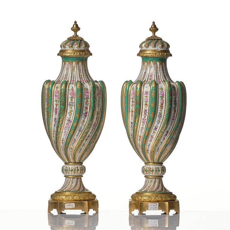 A pair of French 'Sèvres' porcelain urns, 1890s.