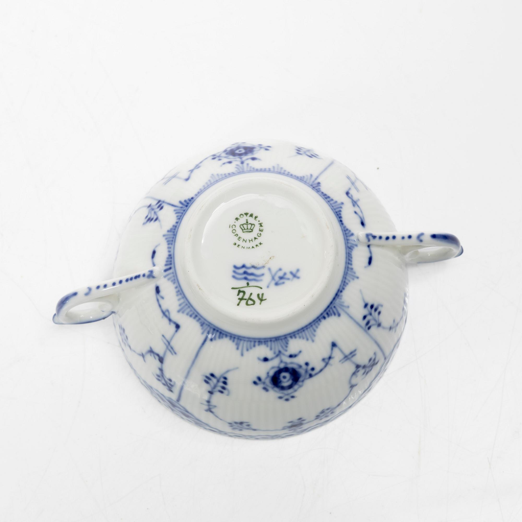 Royal Copenhagen, a set of nine consommé bowls with covers and saucers, and two cups without saucers, "Blue fluted half lace", 1960s.