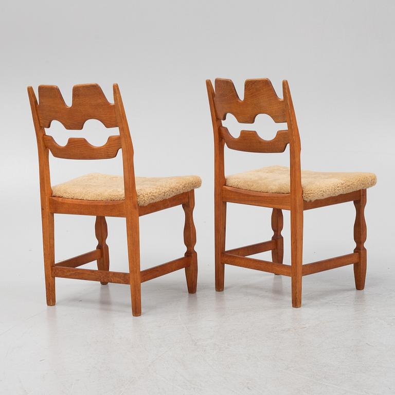 Henning Kjærnulf, a set of six oak 'Razorblade' chairs with new sheepskin upholstery, Nyrups, Denmark, 1960s.