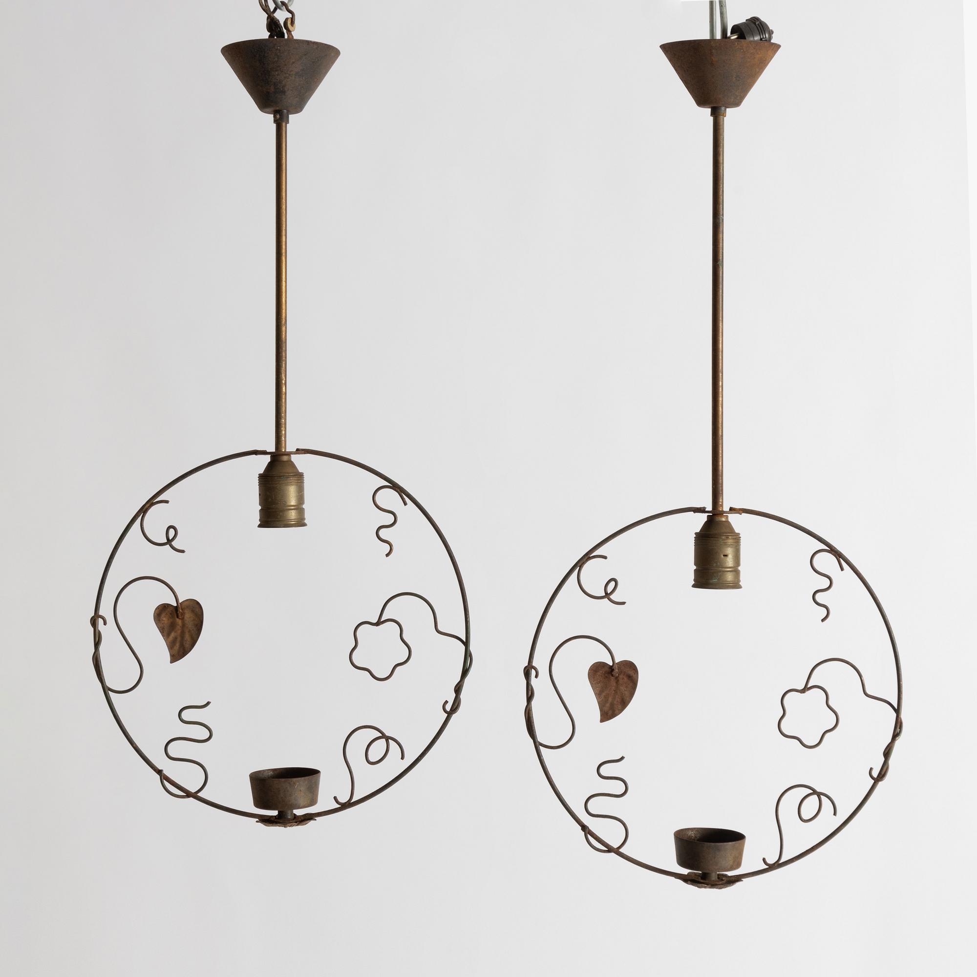 A pair of Swedish Modern ceiling lamps, 1940s.