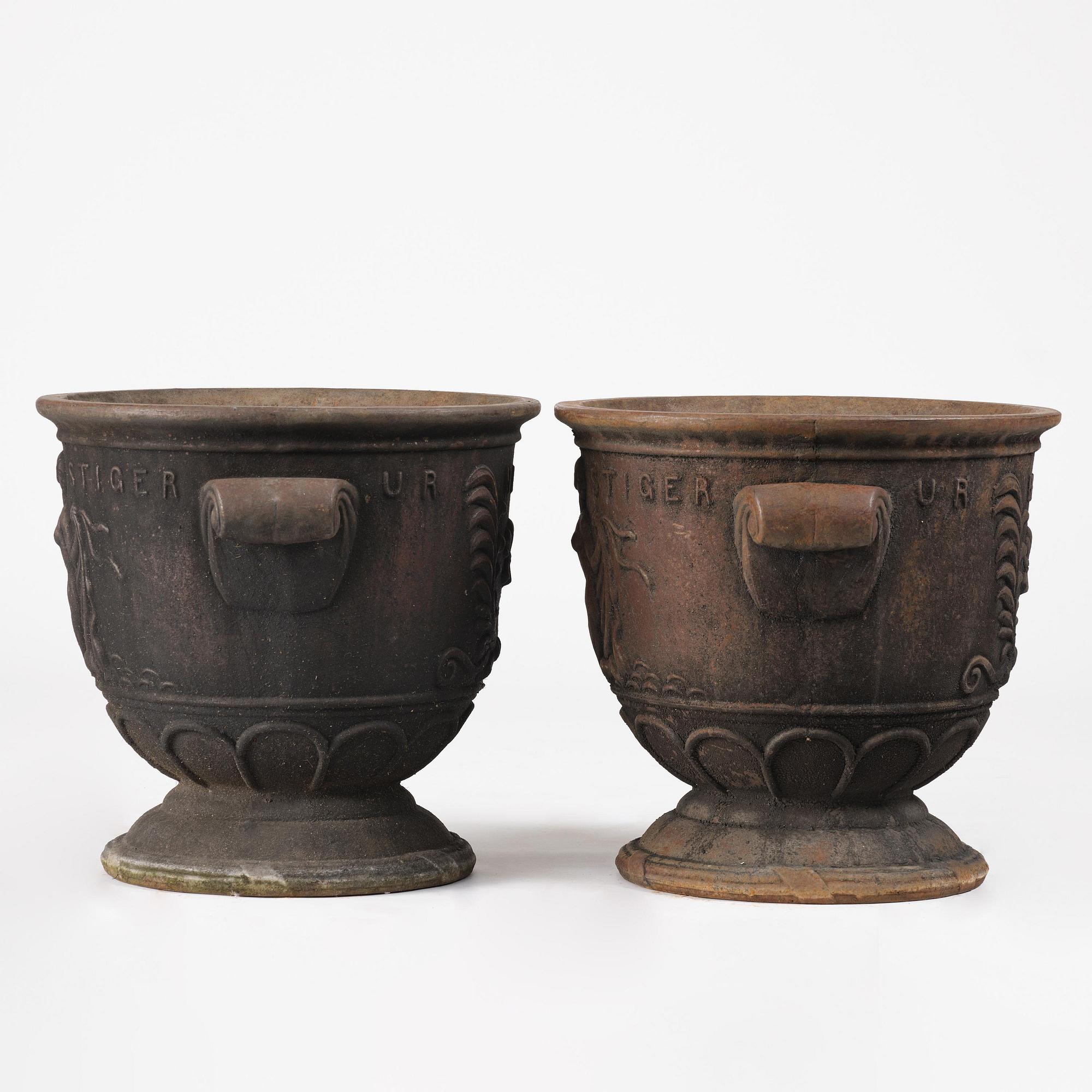 Ivar Johnsson, a pair of "Venus" cast iron urns, Näfveqvarns bruk, Swedish Grace.