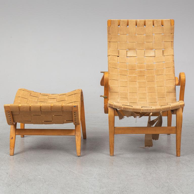 An mid 20th Century easy chair  and stool by Bruno Mathsson for Karl Mathsson Värnamo.