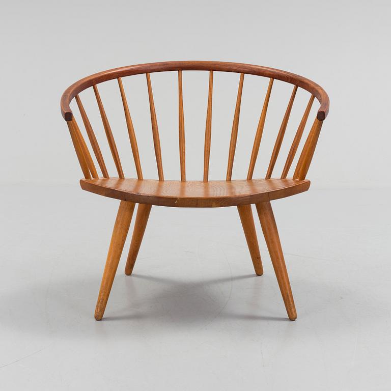 A teak 'Arka' armchair.