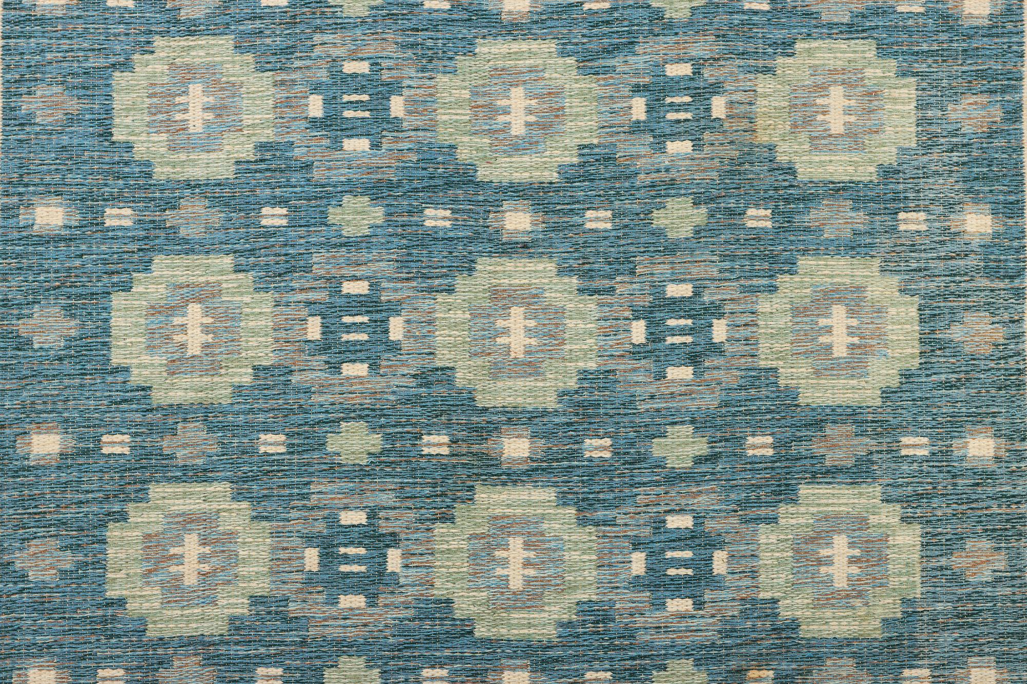 A flat weave rug, a. 196 x 141 cm.
