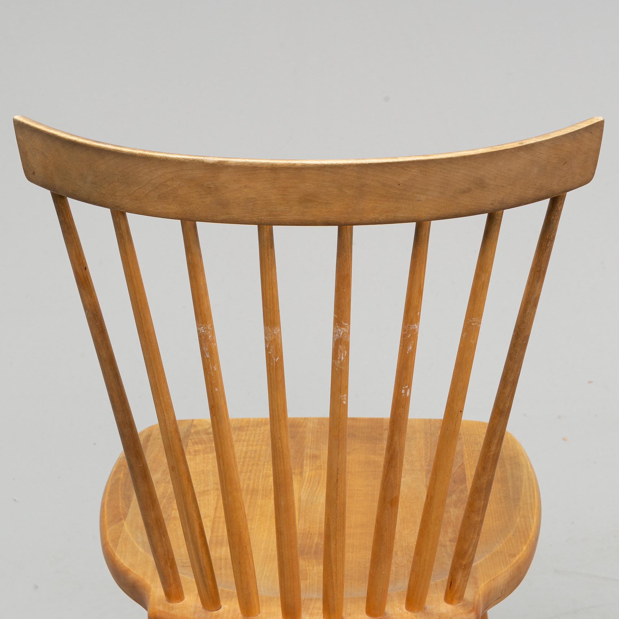 A set of eight 'Lilla Åland' birch chairs by Carl Malmsten for Stolab dated 1996.