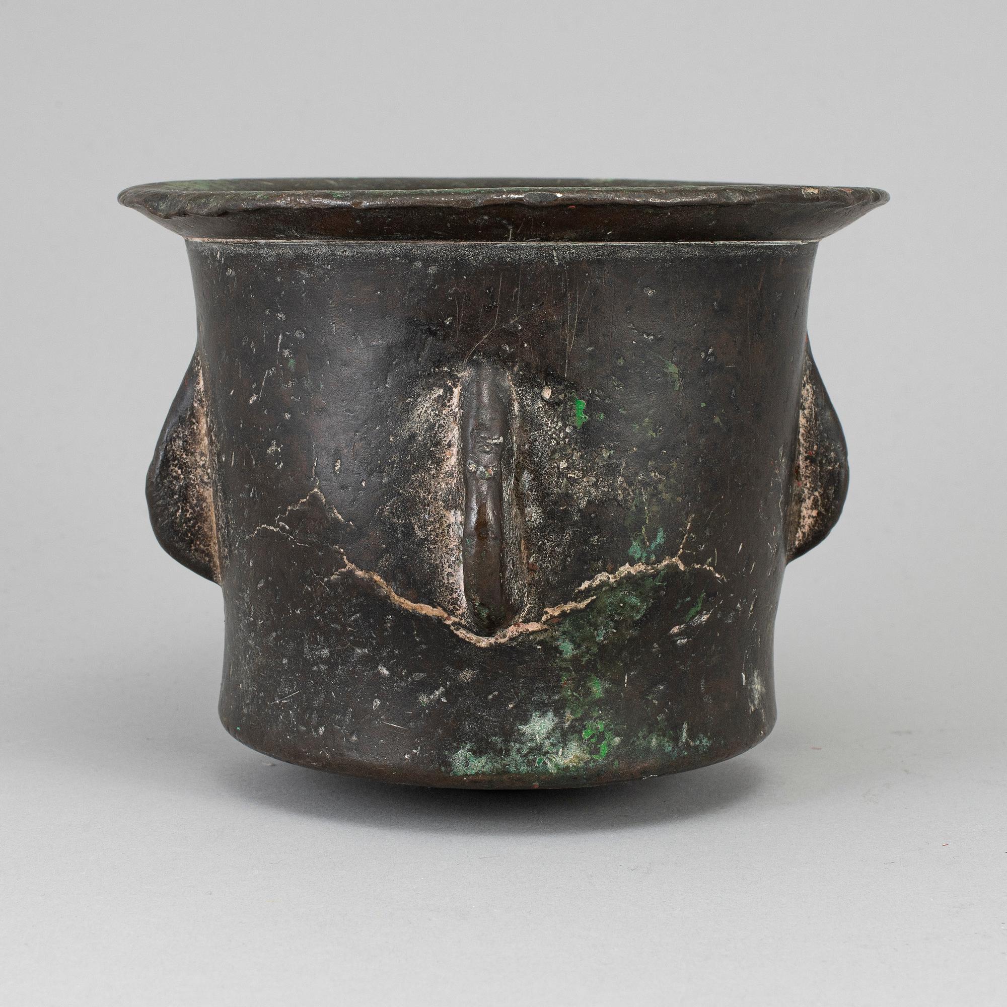 A 15th century bronze mortar.