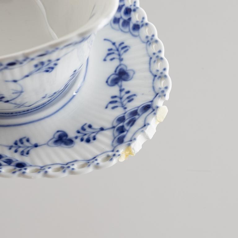 A 84-piece porcelain "Blue Fluted" service, mostly full lace, Royal Copenahgen, Denmark.