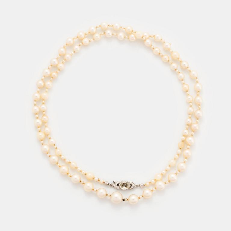 A cultured pearl necklace with a WA Bolin clasp.