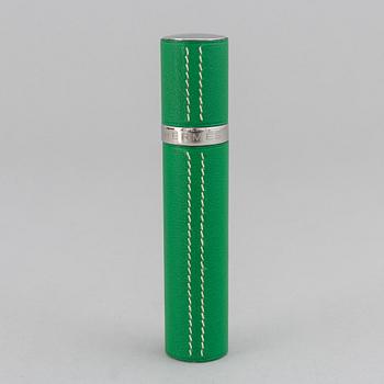 Hermès, refillable perfume bottle in leather.