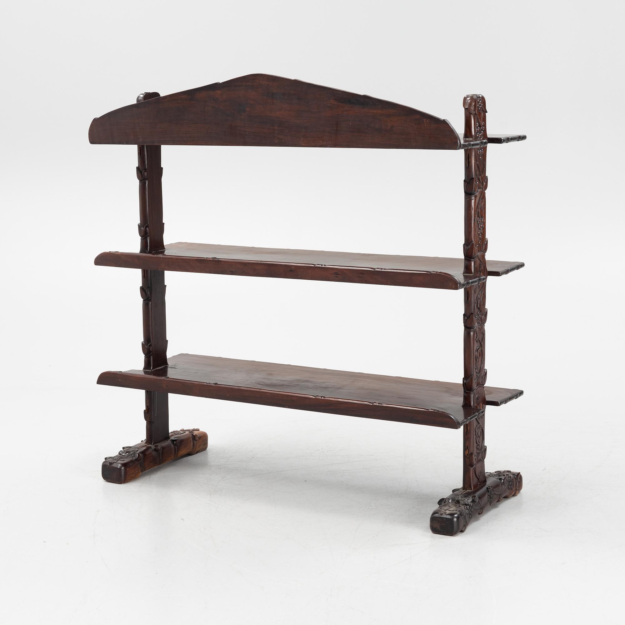 A Chinese hardwood shelf, 20th century.