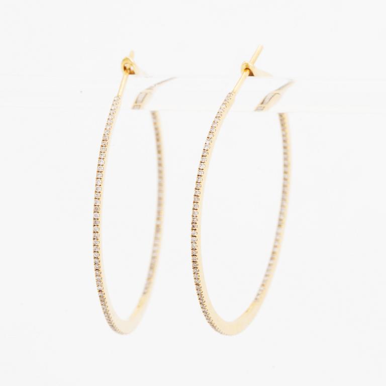 Sophie by Sophie, 18K gold and diamond hoop earrings.