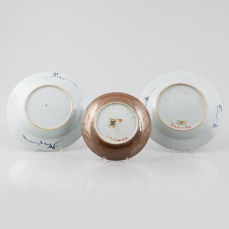 A group of three Chinese blue and white dishes, Qing dynasty, 18th century.