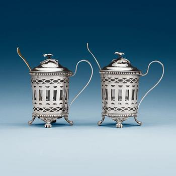 A pair of Swedish 18th century silver mustard-pots and spoons, makers mark of Simson Ryberg, Stockholm 1794.